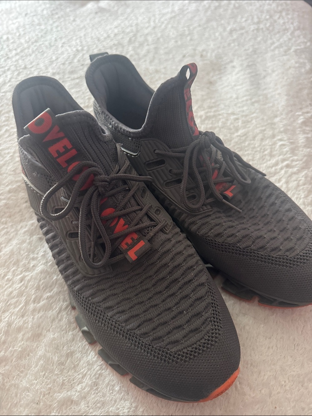 Black Athletic Knit Sneakers with red Accents. Only worn a few times.